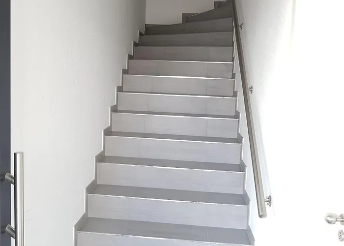 By Janzen O Apartman *