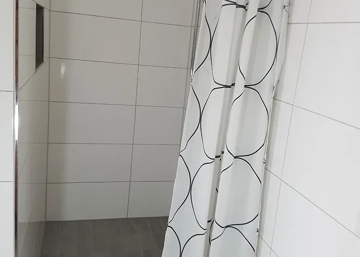 By Janzen O Apartman *